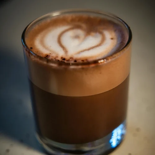 A glass of Nutella latte consists of espresso, milk, and Nutella sauce
