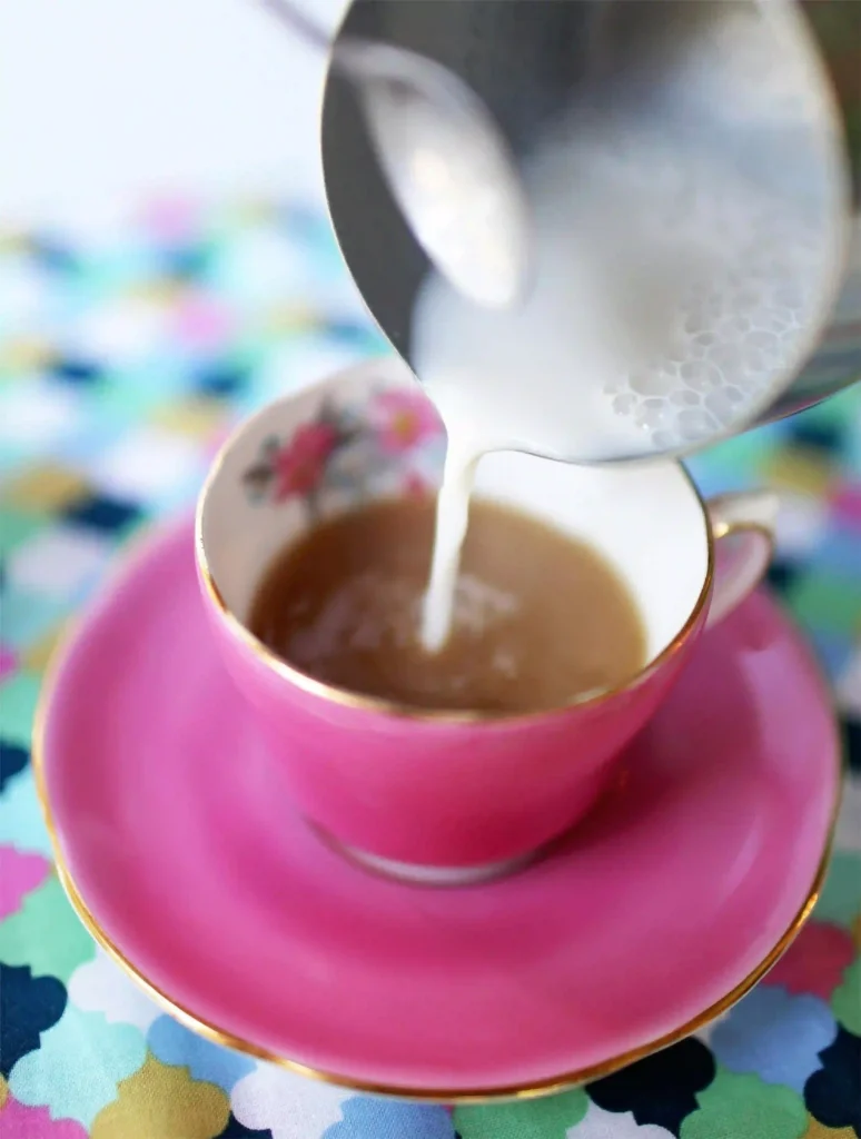 Adding milk to coffee