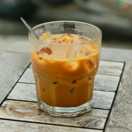 A glass of iced coffee with milk
